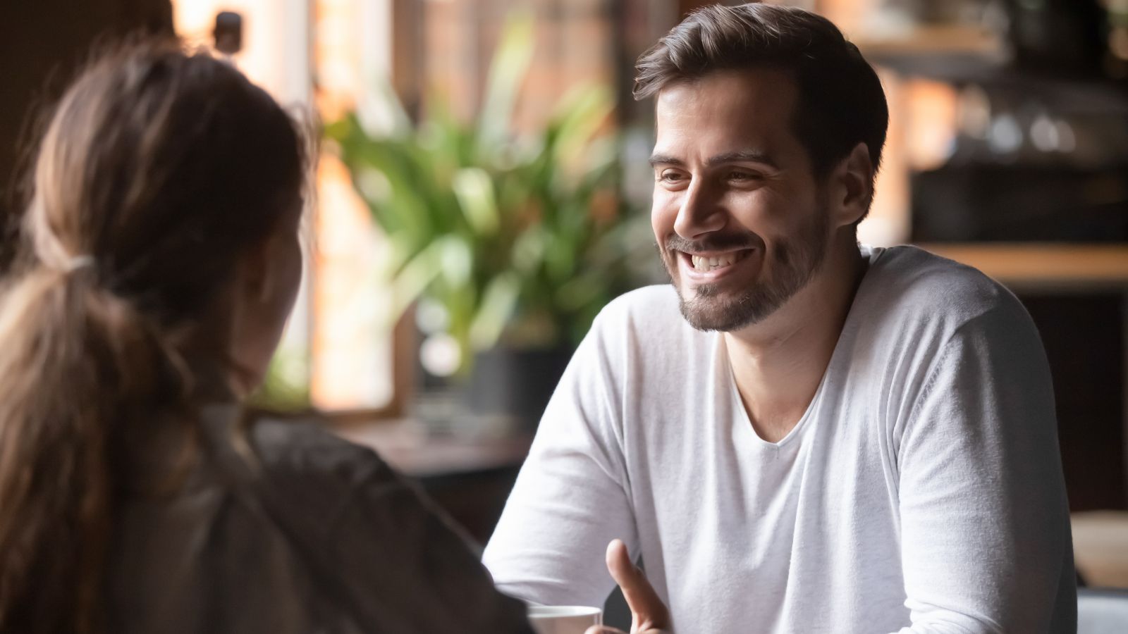 Business owner smiling during a conversation with their accountant