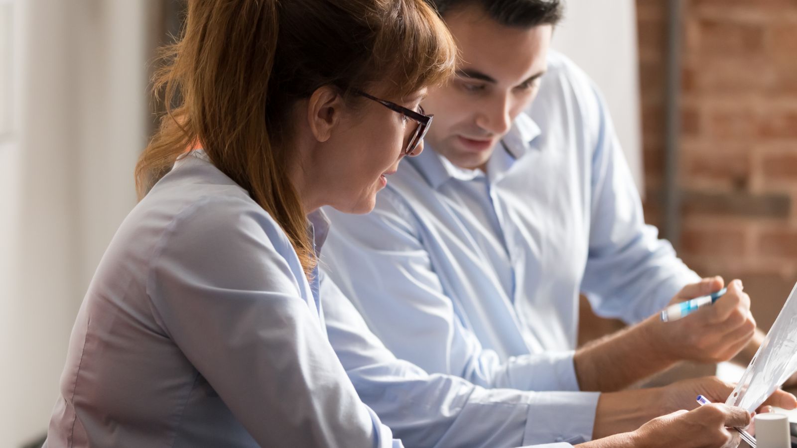 Accountant helping a business owner with their R&D tax claims