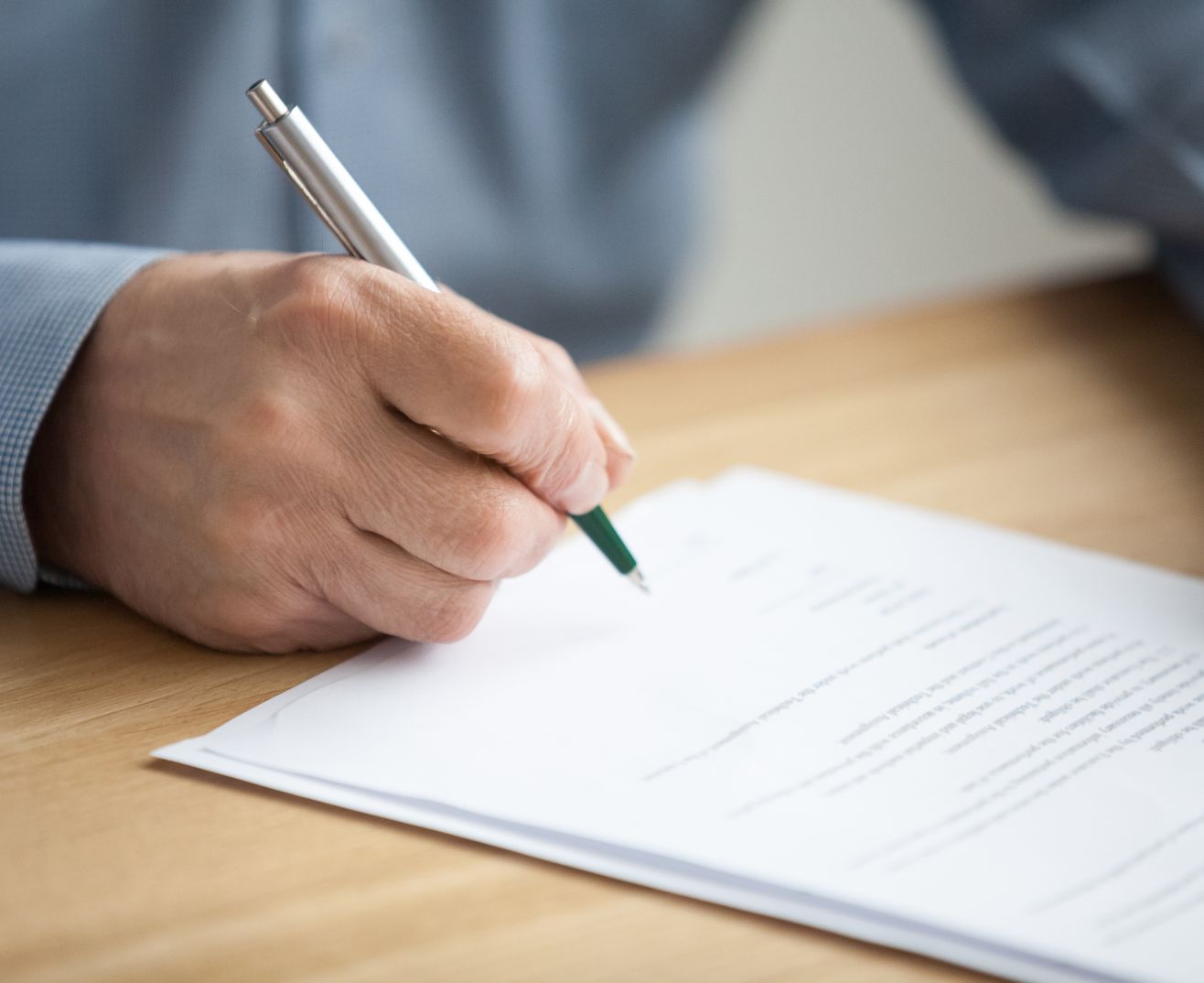 Accountant taking notes during a meeting