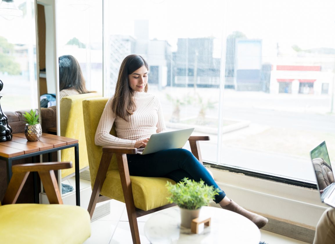 Business owner using a laptop to access their business information