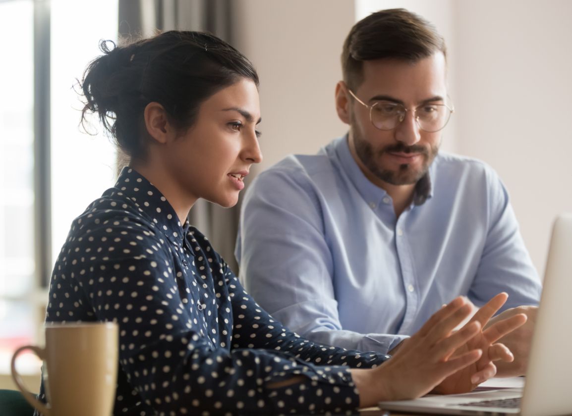 Accountant showing a business owner how to access their data